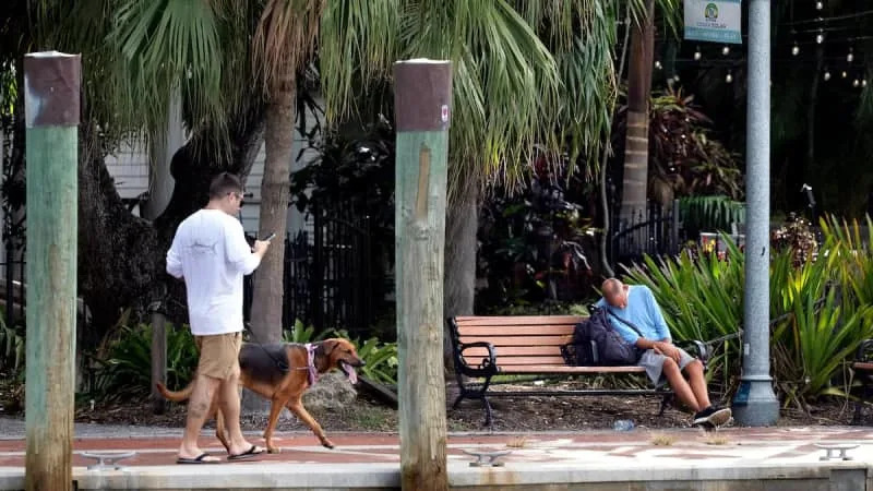 Florida city’s Riverwalk still a homeless hot spot despite new anti-camping law, critics say
