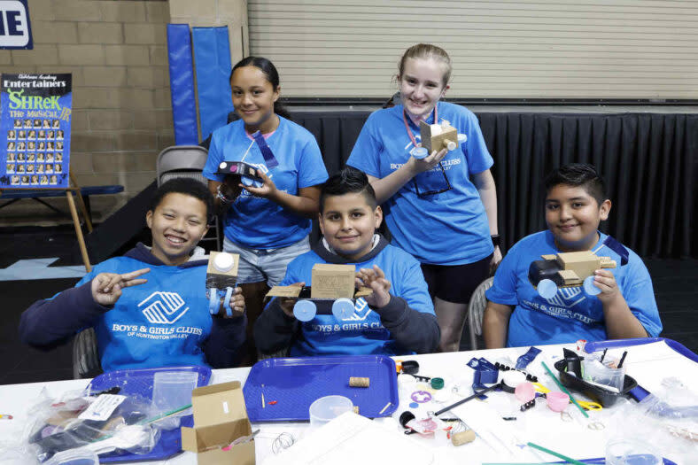 Students learn about design concepts for future mobility vehicles at the Genesis STEAM event.