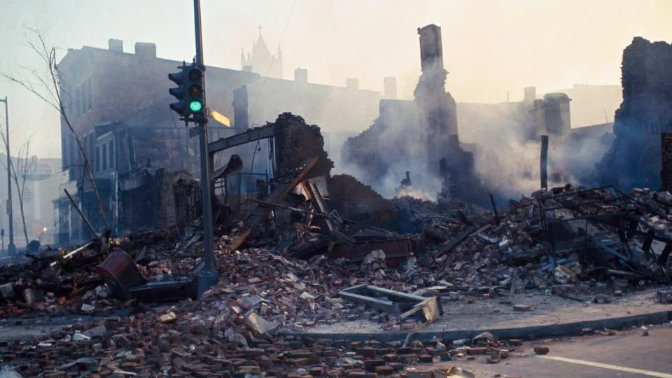 A burned-out building, which was destroyed by arsonists during a night of burning and looting triggered by the assassination of the Rev. Martin Luther King, Jr., is seen on April 6, 1968. - Bettmann Archive/Getty Images
