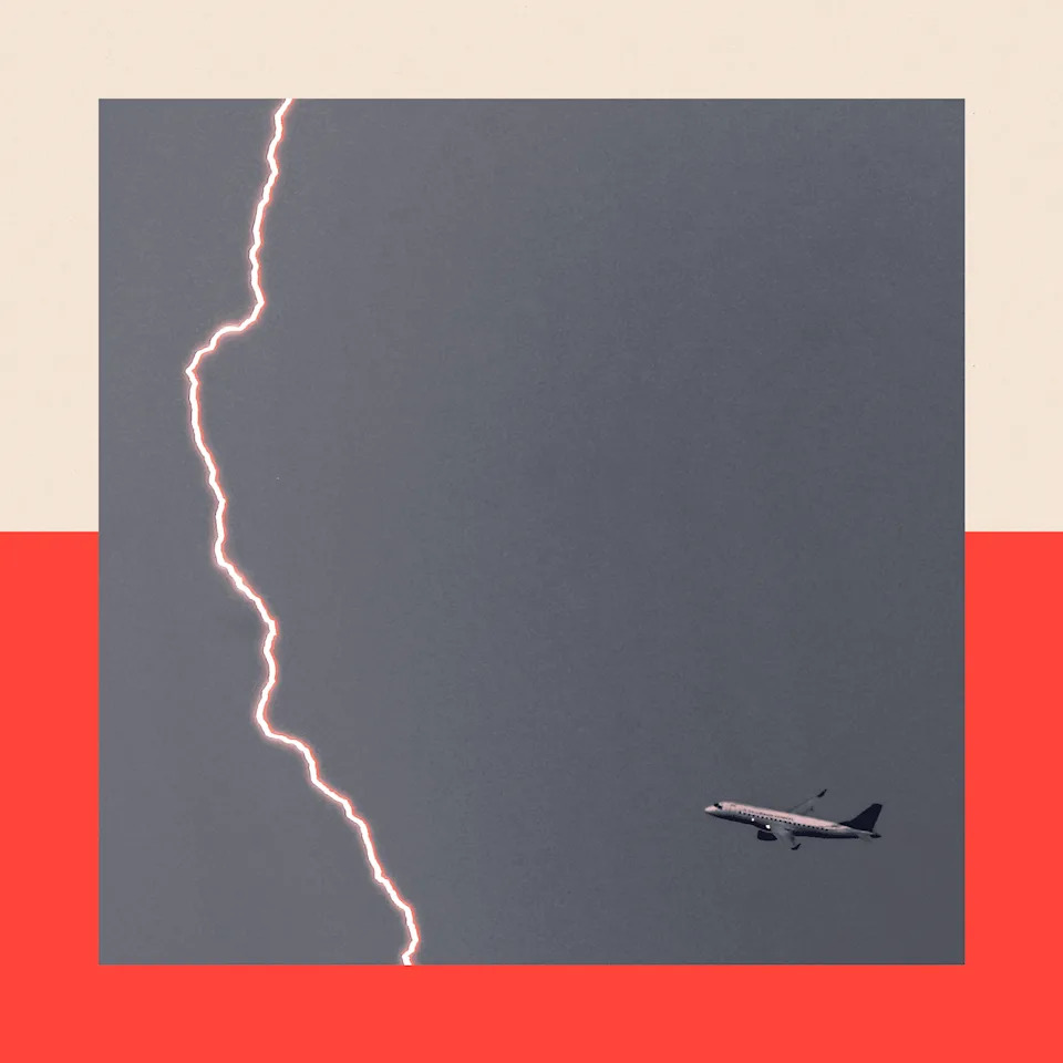 Lightning strikes near a departing airliner at Logan airport