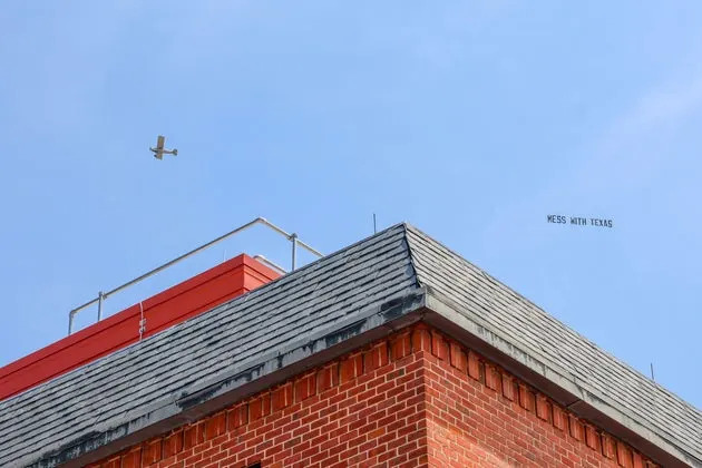 A view of the plane and sign flying in Annapolis.