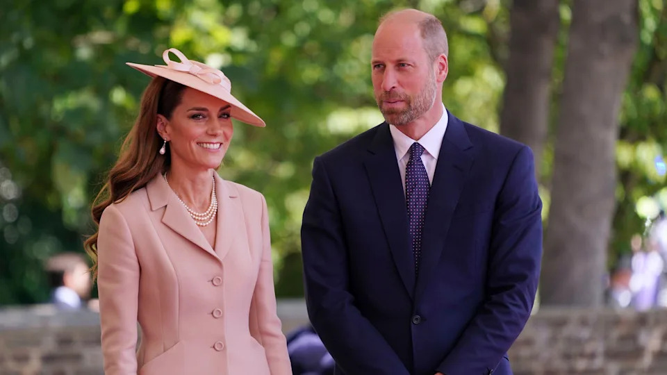 The Prince and Princess of Wales at Datchet Road in Windsor, Berkshire, on day one of the French President's state visit to the UK. Kate is smiling for the camera while William is looking away.