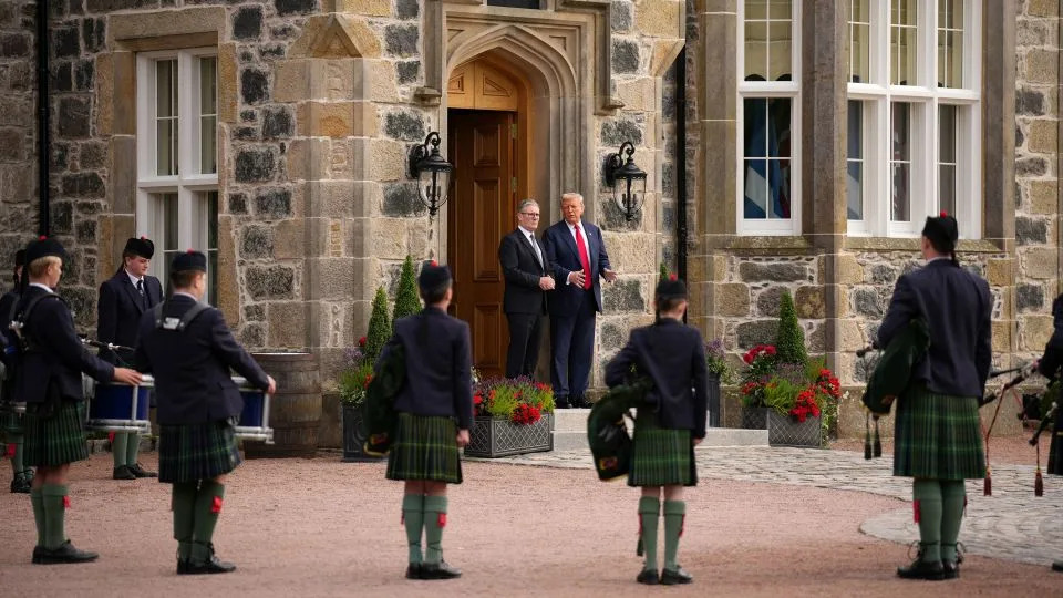 US President Donald Trump and British Prime Minister Keir Starmer arrive at Trump MacLeod House & Lodge in Balmedie, Aberdeenshire, Scotland, after flying on the Marine One helicopter on Monday. - Andrew Harnik/Getty Images