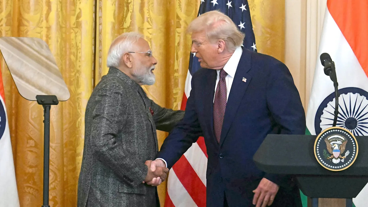 US President Donald Trump shakes hands with Indian Prime Minister Narendra Modi during a joint press conference in the East Room of the White House in Washington, DC, on February 13, 2025.