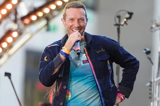 John Nacion/FilmMagic Chris Martin of Coldplay performs on NBC's 'Today' at Rockefeller Plaza on October 08, 2024