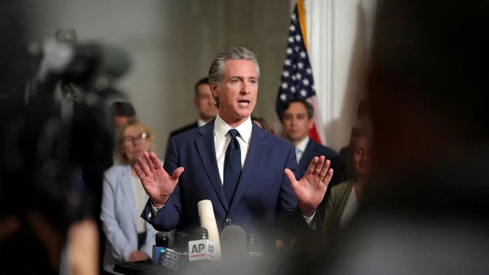 California Gov. Gavin Newsom speaks at a press conference, accompanied by Texas Democratic legislators, at the governor’s mansion in Sacramento on August 8. - Carlos Barria/Reuters