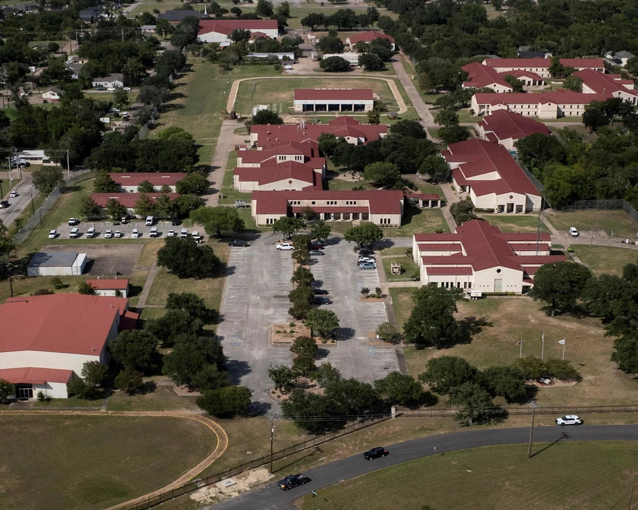 <span>The federal prison camp in Bryan, Texas, where Ghislaine Maxwell is now being held. It is known for its more campus feel and celebrity inmates.</span><span>Photograph: Adrees Latif/Reuters</span>