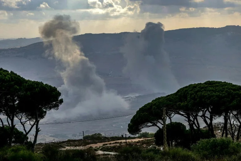 Smoke rises over the al-Khardali area of south Lebanon following an Israeli air strike. (Rabih DAHER)