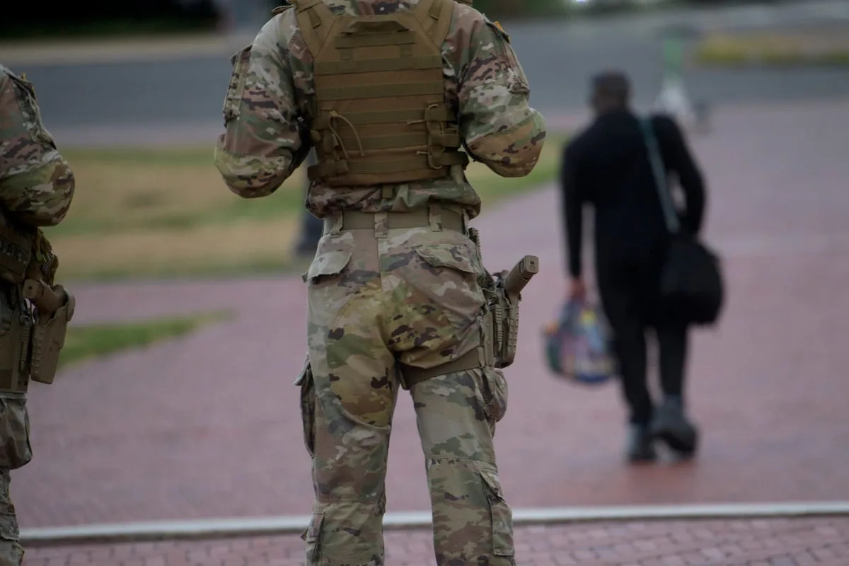 National Guard now carrying pistols in Washington as troops enter third week deployed to capital