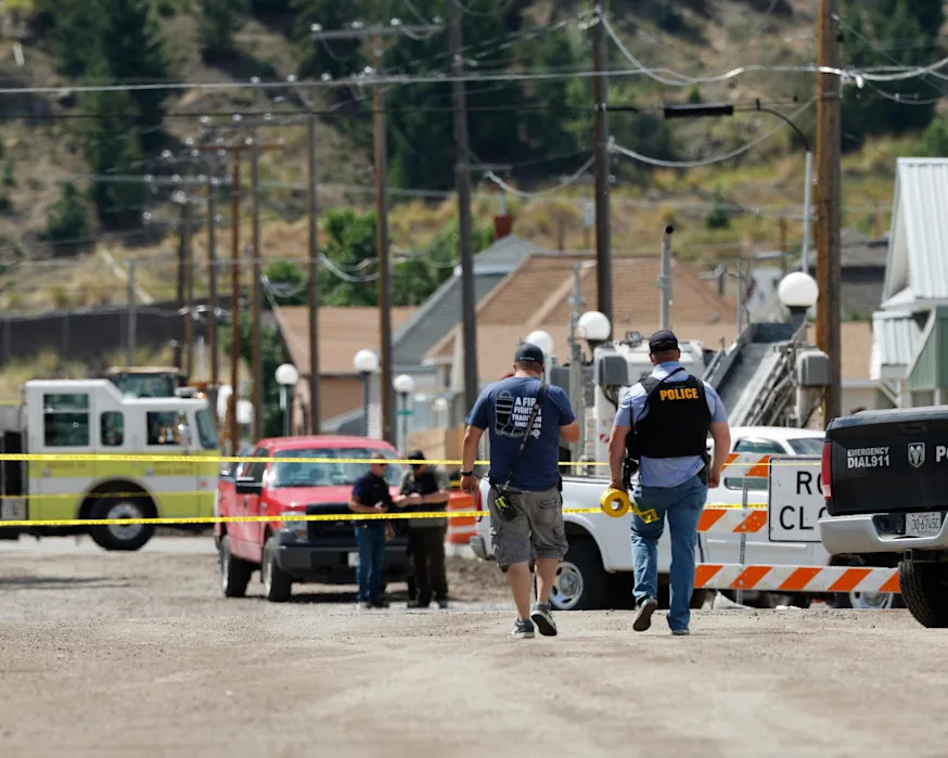 <span>Police and other emergency personnel are seen after the shooting in Anaconda, Montana.</span><span>Photograph: Joseph Scheller/AP</span>