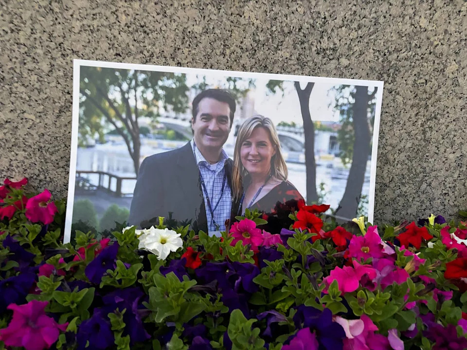 A photograph of Melissa Hortman and her husband amongst flowers (Selina Guevara / NBC News)