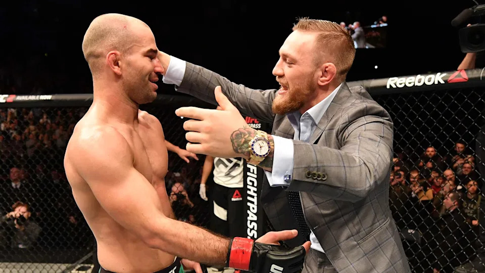 BELFAST, NORTHERN IRELAND - NOVEMBER 19: (L-R) Artem Lobov of Russia celebrates with teammate and UFC champion Conor McGregor after his featherweight bout against Teruto Ishihara during the UFC Fight Night at the SSE Arena on November 19, 2016 in Belfast, Northern Ireland. Lobov defeated Ishihara by unanimous-decision. (Photo by Brandon Magnus/Zuffa LLC/Zuffa LLC via Getty Images)