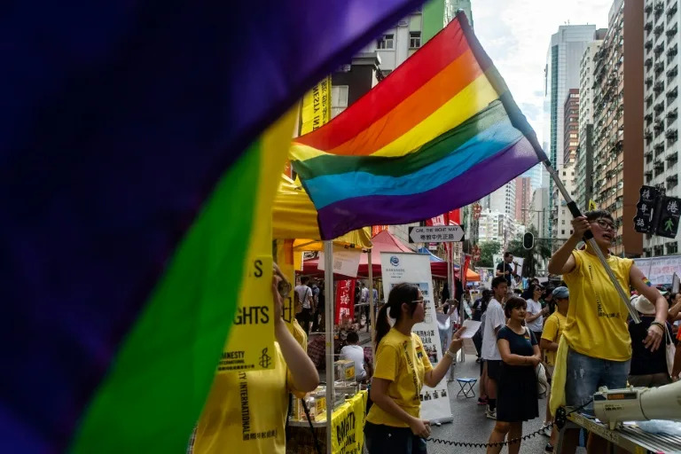 Hong Kong's top court confined marriage to heterosexual couples but ordered the government to create an "alternative framework" for same-sex couples (Philip FONG)