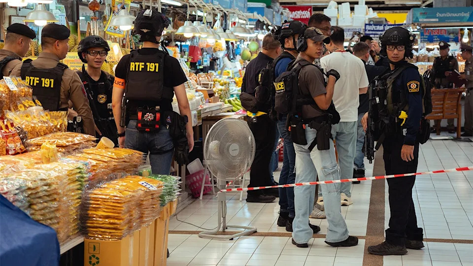 police on scene after deadly shooting at bangkok market