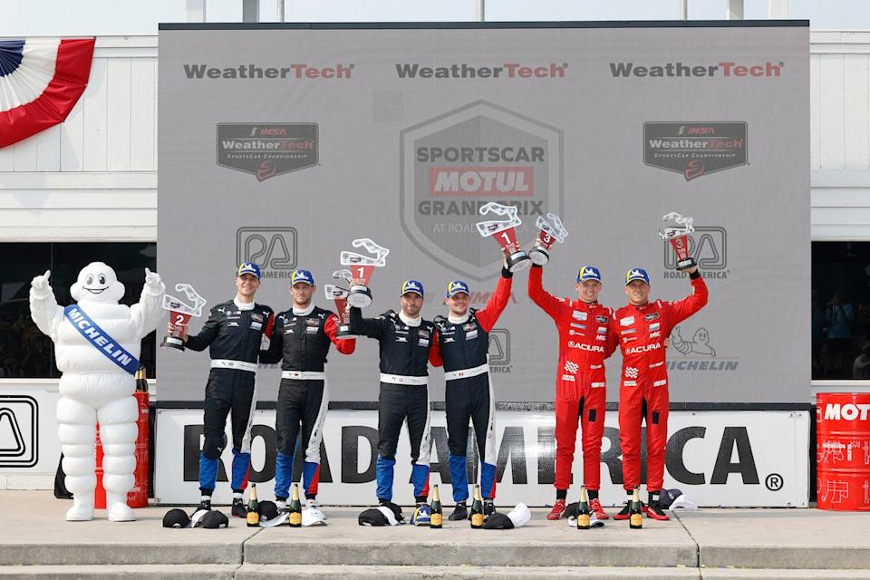 #25: bmw m team rll, bmw m hybrid v8, gtp: marco wittmann, sheldon van der linde, #24: bmw m team rll, bmw m hybrid v8, gtp: philipp eng, dries vanthoor, #93: acura meyer shank racing w/curb agajanian, acura arx 06, gtp: renger van der zande, nick yelloly on the podium