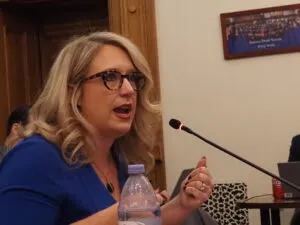  Indiana Education Secretary Katie Jenner testifies in committee on Thursday, Feb. 29, 2024. (Leslie Bonilla Muñiz/Indiana Capital Chronicle)