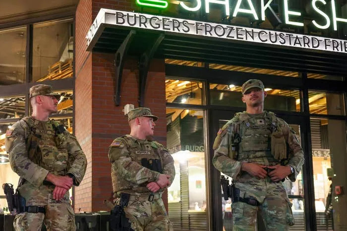 People Have A LOT To Say About This Video Of National Guard Members Picking Up Trash In DC