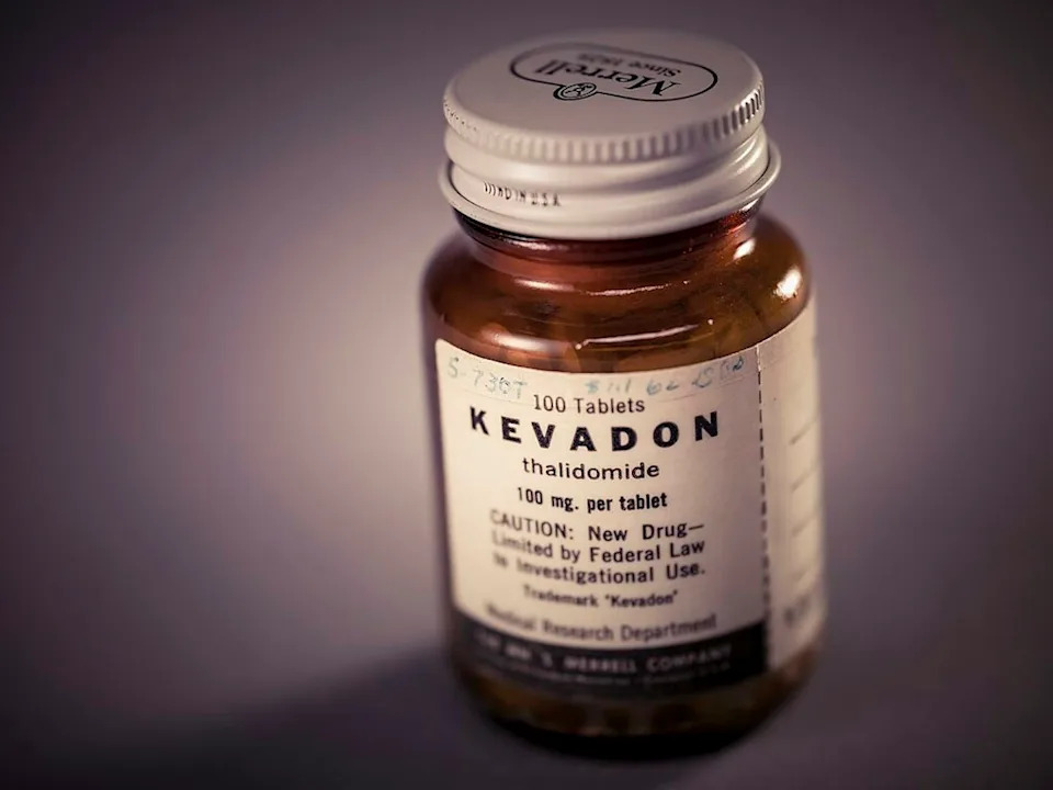 A pill bottle with a label carrying the drug's brand name, Kevadon, and its generic name, thalidomide.