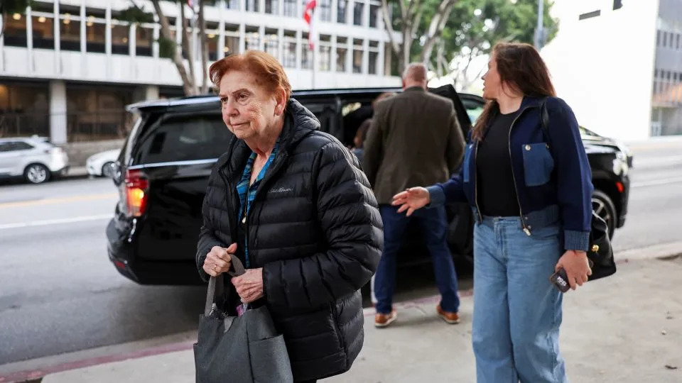 Teresita Baralt, sister of Jose Menendez, walks on the day that members of Jose and Kitty Menendez’s family meet with District Attorney Nathan Hochman to press for the resentencing of Erik and Lyle Menendez's first-degree murder convictions, in Los Angeles in January. - David Swanson/Reuters