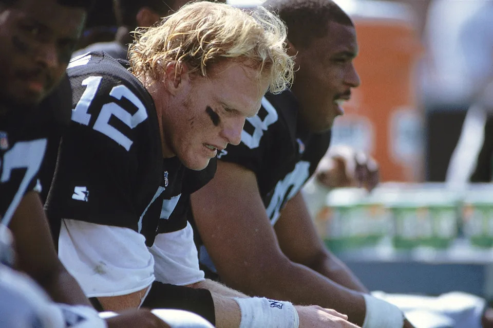 Football: Closeup of Los Angeles Raiders QB Todd Marinovich (12) on sidelines bench during game vs Cleveland Browns at Memorial Coliseum.
Los Angeles, CA 9/20/1992
CREDIT: Richard Mackson (Photo by Richard Mackson /Sports Illustrated via Getty Images)
(Set Number: X43375 )