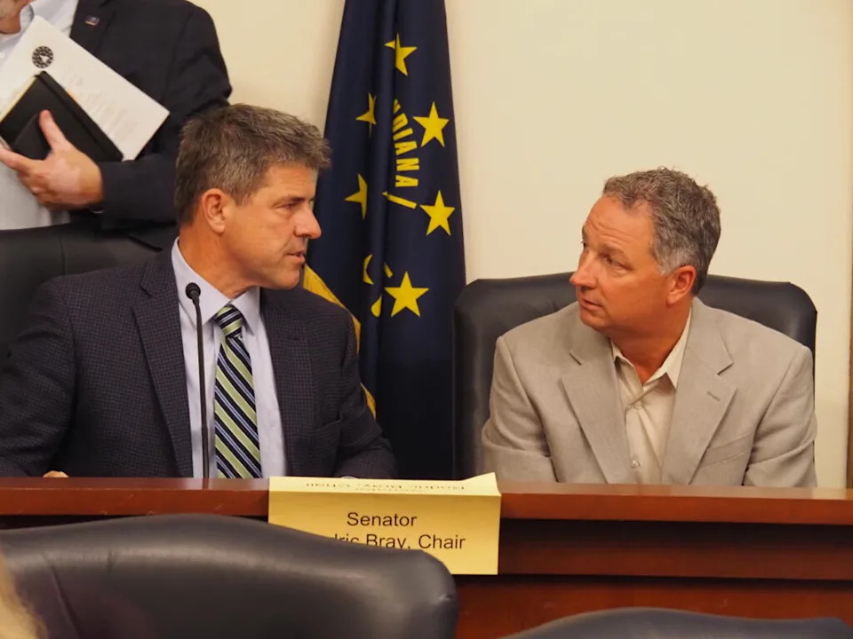  GOP Senate President Pro Tempore Rodric Bray and House Speaker Todd Huston talk after a Legislative Council meeting on Wednesday, June 25, 2025. (Leslie Bonilla Muñiz/Indiana Capital Chronicle)