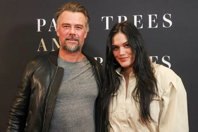  Rodin Eckenroth/Getty Images Josh Duhamel (left) and Audra Mari (right) in March 2023.