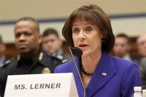 FILE - This March 5, 2014 file photo shows former Internal Revenue Service (IRS) official Lois Lerner on Capitol Hill in Washington. IRS employees erased computer backup tapes a month after officials discovered that thousands of emails related to the tax agency's tea party scandal had been lost, according to government investigators. (AP Photo/Lauren Victoria Burke, File)