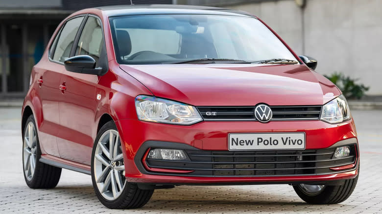 A parked red Volkswagen Polo Vivo