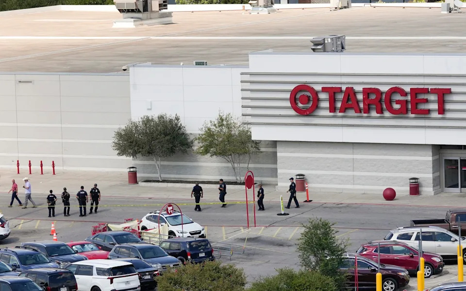 Police outside the Target store, where the shooting unfolded