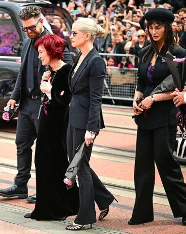 Victoria Jones/Shutterstock Jack Osbourne, Sharon Osbourne, Kelly Osbourne and Aimee Osbourne in July 2025