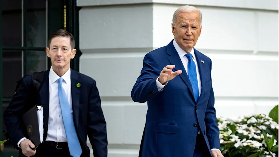 Bruce Reed at left, Joe Biden waving