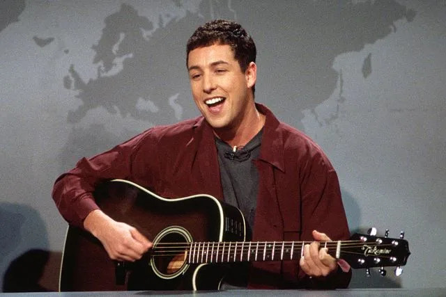 Alan Singer/NBCU Photo Bank Adam Sandler performing on 'SNL' in 1994