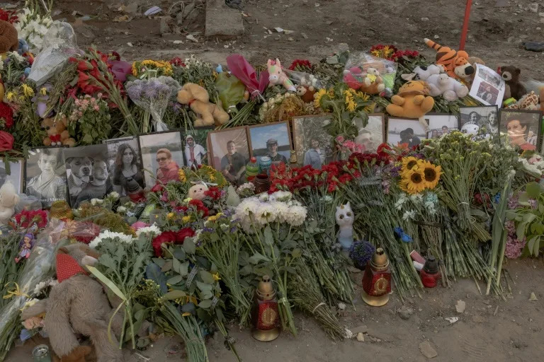 Kyiv buries soldier's wife and daughters killed in Russian attack