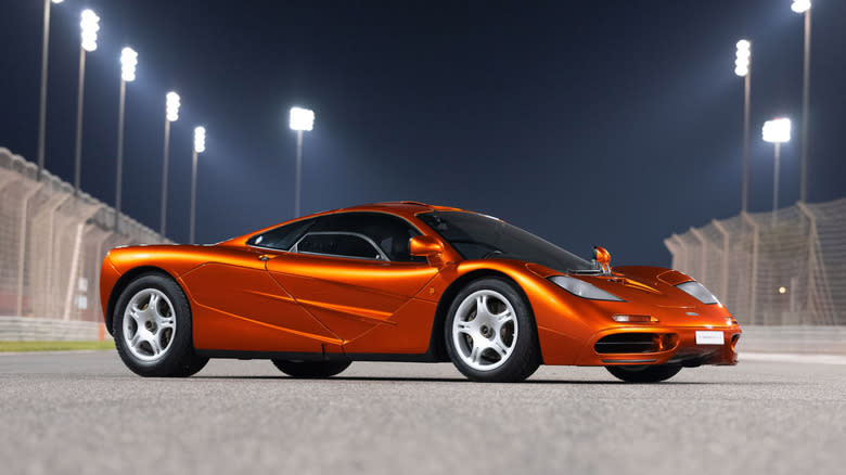 Monsour Ojjeh's metallic orange McLaren parked on the Bahrain International Circuit