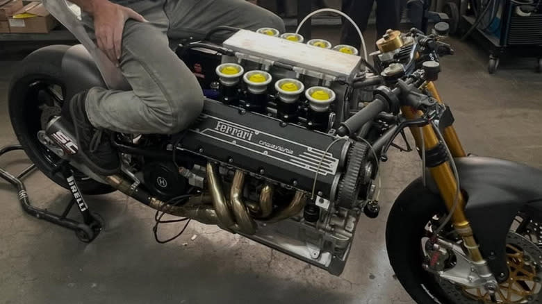 A Ferrari V8 motorcycle, with velocity stacks.