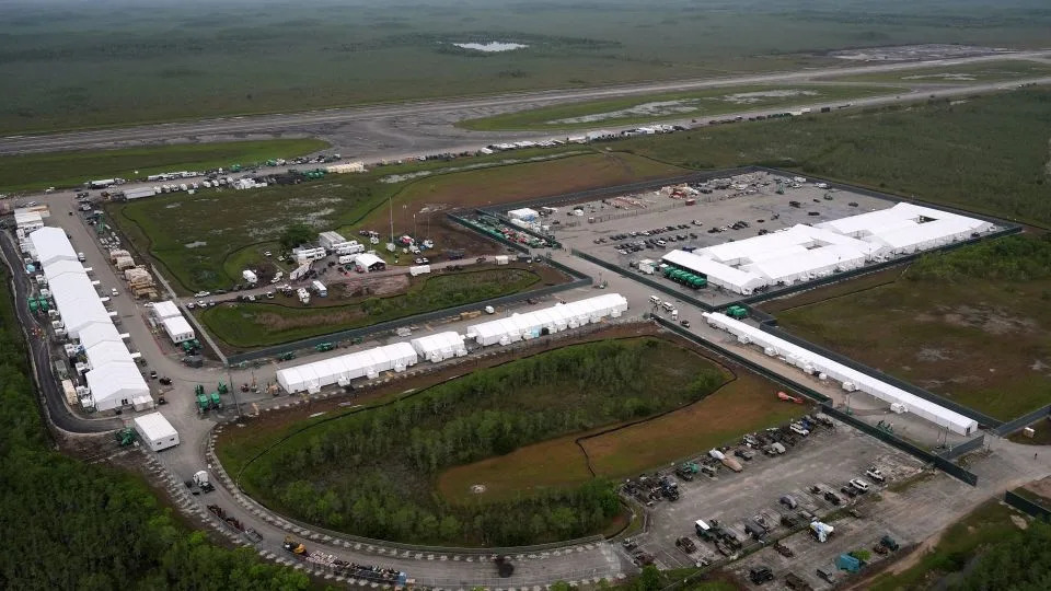 Work progresses July 4 on the migrant detention facility dubbed &quot;Alligator Alcatraz&quot; at Dade-Collier Training and Transition facility in the Florida Everglades. - Rebecca Blackwell/AP