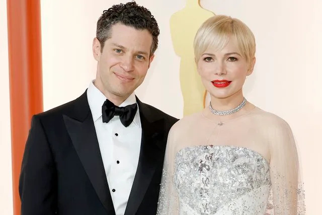 Mike Coppola/Getty Michelle Williams and husband Thomas Kail at the 2023 Academy Awards