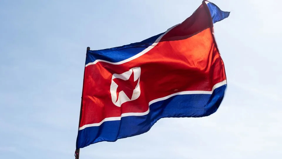 The national flag of North Korea seen during the celebration of International Workers' Day. - Kristian Tuxen Ladegaard Berg/SOPA Images/LightRocket/Getty Images