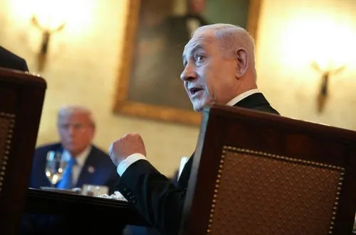 Israeli Prime Minister Benjamin Netanyahu speaks alongside U.S. President Donald Trump during a dinner in the Blue Room of the White House on July 07, 2025 in Washington, DC.