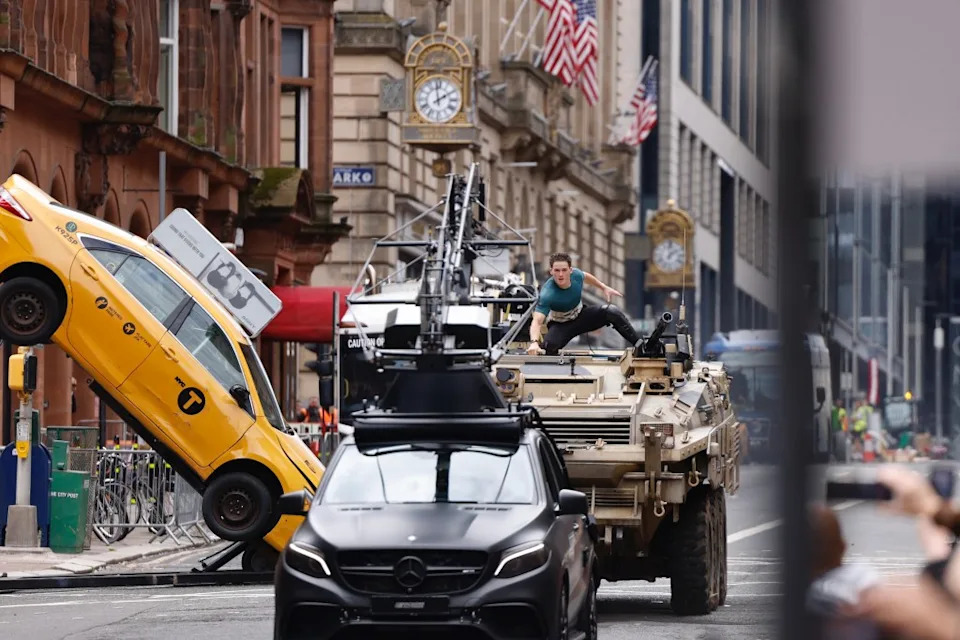 Cars and taxi cabs were brought in to help make Glasgow look like NYC. / SplashNews.com
