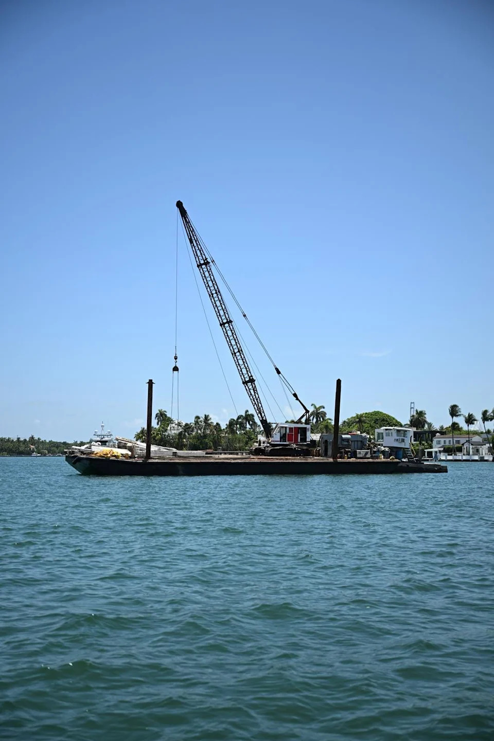 The barge from the vessel collision near Hibiscus Island, July 28, 2025, that resulted in three girls dead. Coast Guard Sector Miami crews are investigating the potential causes of the collision.