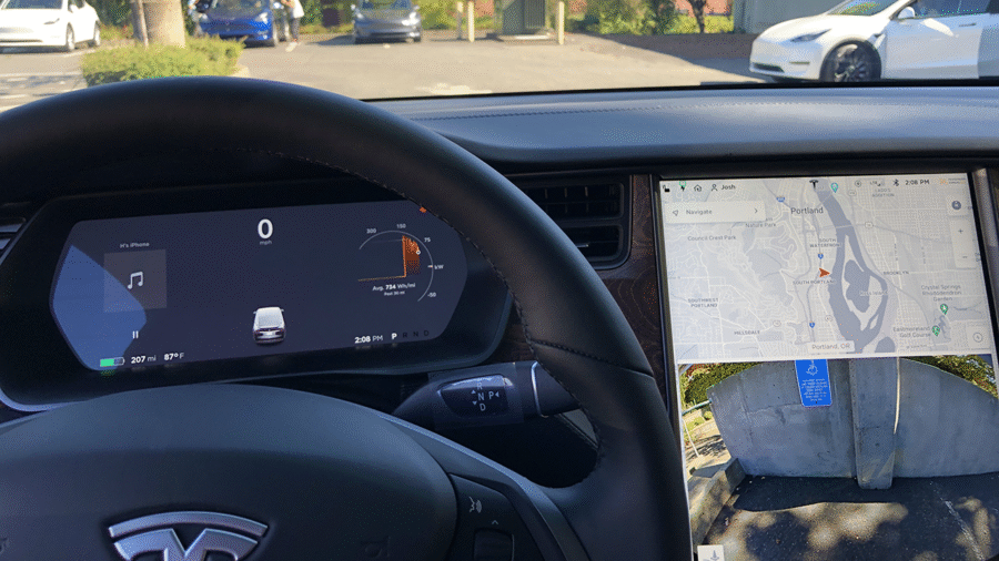 Dashboard of a 2016 Tesla Model S with limited self-driving.