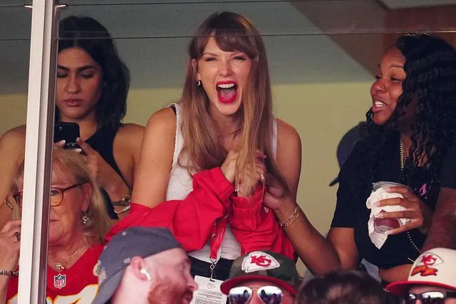 Jason Hanna/Getty Taylor Swift cheers on Travis Kelce at a Chiefs game in Kansas City in September 2023.