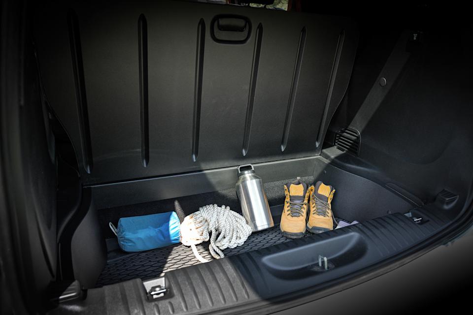 A large cargo floor panel opens up to provide loads of extra storage space for the Chrysler Pacifica Grizzly concept.