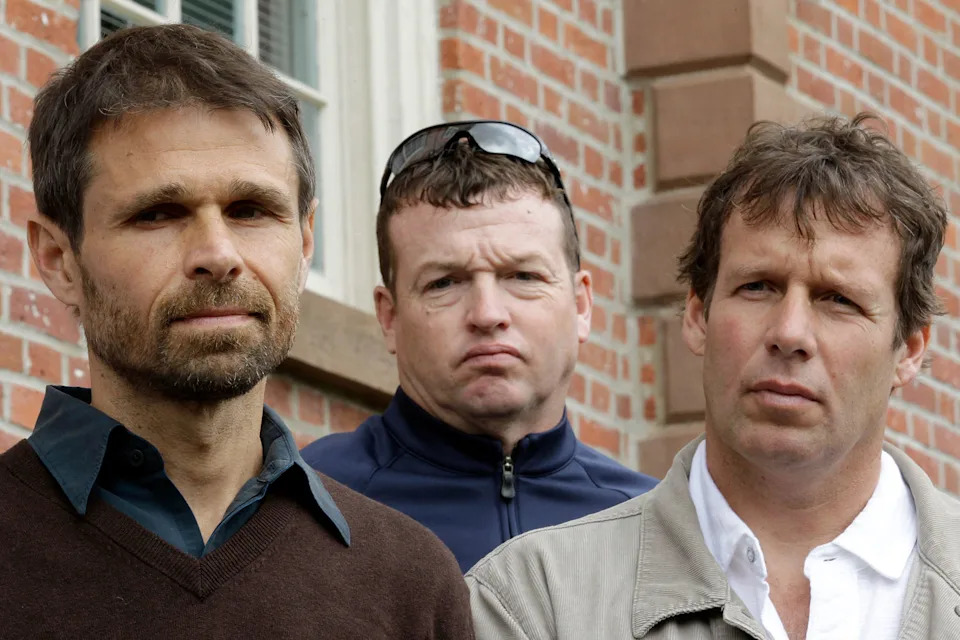 Brothers Bill Crane, center, and Tom Crane, right, with Steve Badt during a news conference outside the Morris County Courthouse, in Morristown, N.J., in 2012. Badt, a former student at Delbarton School, is one of two men who are joining a lawsuit initially filed by the Cranes against the Catholic school claiming they were sexually abused by clerics in the 1970s and '80s. (Julio Cortez / AP Photo)
