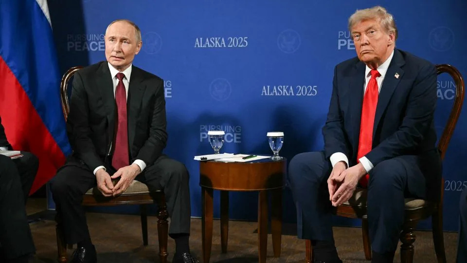 Russian President Vladimir Putin and US President Donald Trump meet at Joint Base Elmendorf-Richardson in Anchorage, Alaska, on Friday. - Andrew Caballero-Reynolds/AFP/Getty Images