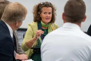  State Sen. Jana Hughes of Seward, center, one of three current senators who sits on the new School Financing Review Commission as nonvoting members. Aug. 12, 2025. (Zach Wendling/Nebraska Examiner)