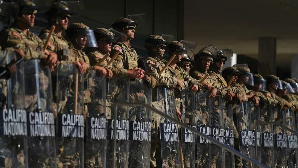 California National Guard members are positioned at the Federal Building in downtown Los Angeles on June 10. - Eric Thayer/AP