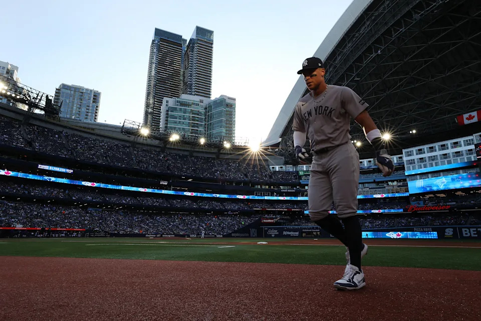 TORONTO, ON - JULY 22  -  New York Yankees outfielder Aaron Judge (99) leaves the field after warming up as the Toronto Blue Jays fall to the New York Yankees 5-4 at Rogers Centre in Toronto. July 22, 2025.  Steve Russell/Toronto Star        (Steve Russell/Toronto Star via Getty Images)