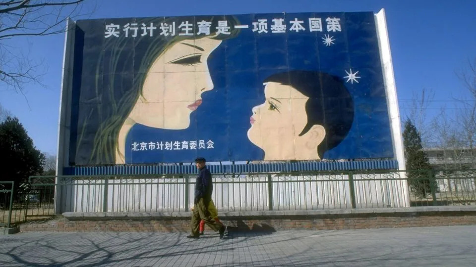 A billboard promoting family planning in Beijing on March 1, 1991 - Forrest Anderson/The Chronicle Collection/Getty Images